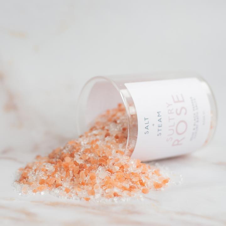 Sultry Rose Bath Salts from Salt + Steam pouring out of a jar